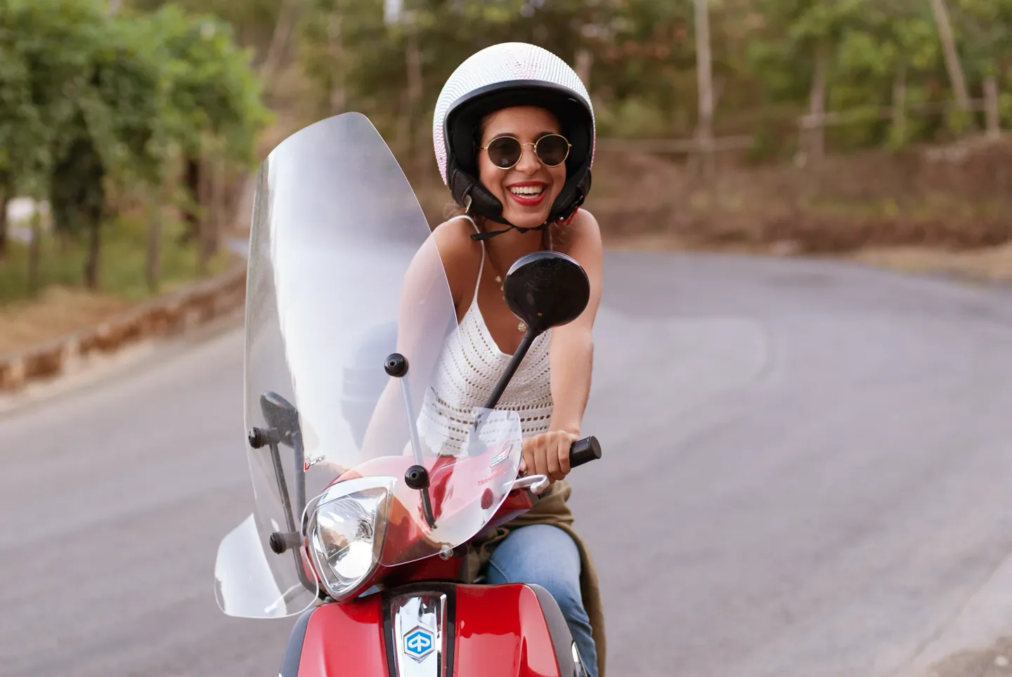 Camelia on a motorbike in Tramonti — frame 07