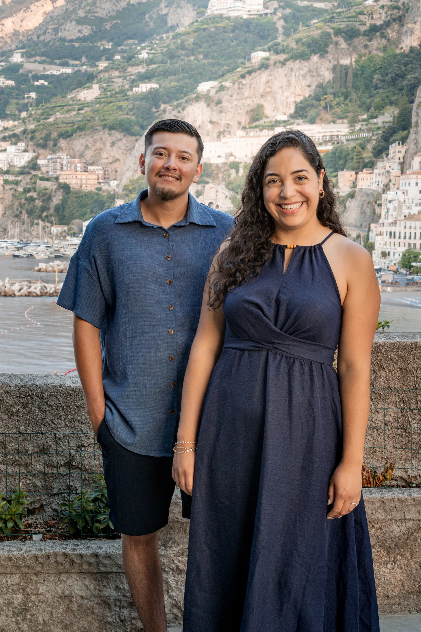Esmeralda and her companion beside the sea wall