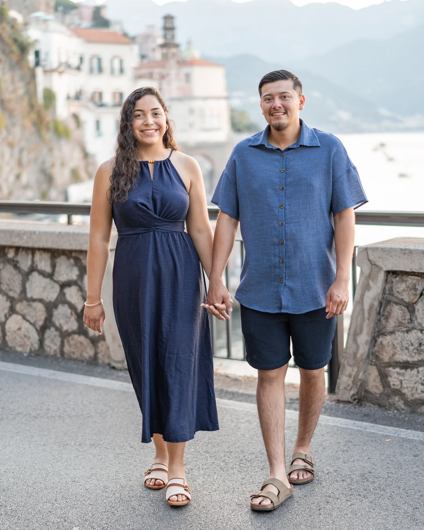 The couple walking towards the camera above Atrani