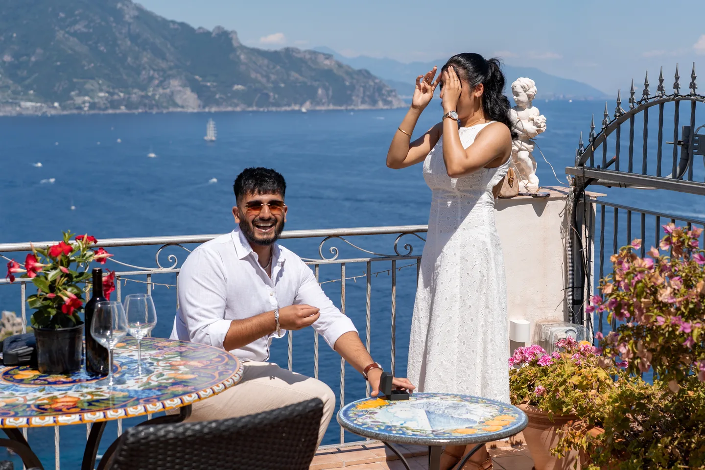 Jassi smiling beside the decorated terrace table