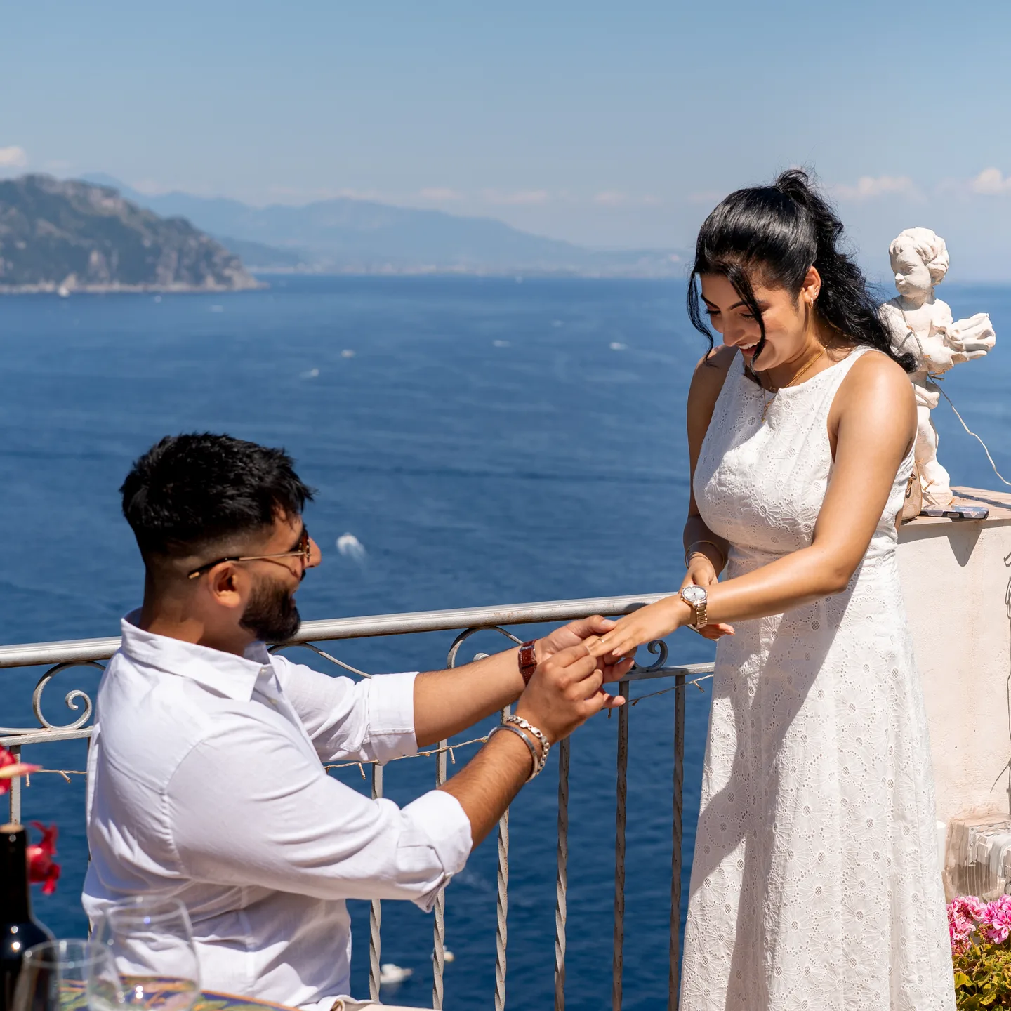 Jassi placing the ring on his partner’s hand
