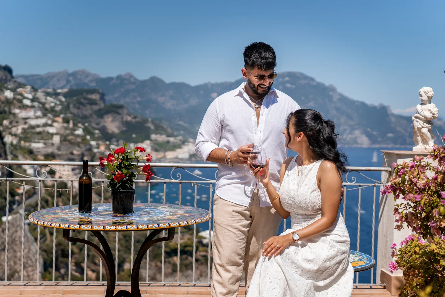 A quiet moment together beside the terrace table