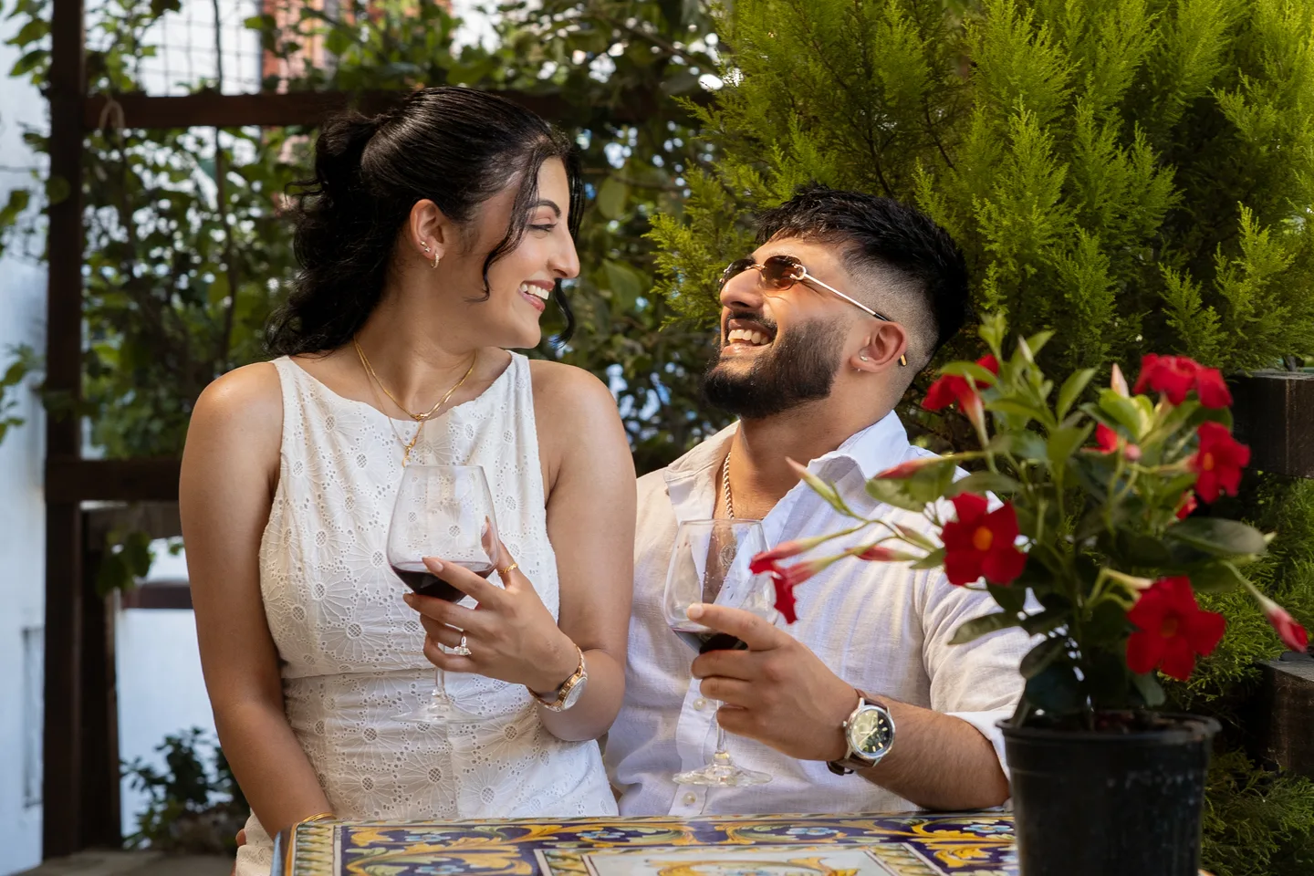 A shared laugh at the garden table