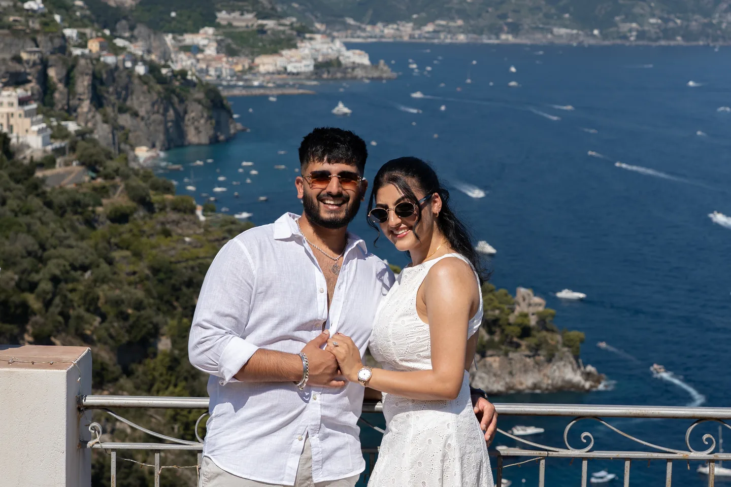 A portrait together above the blue water
