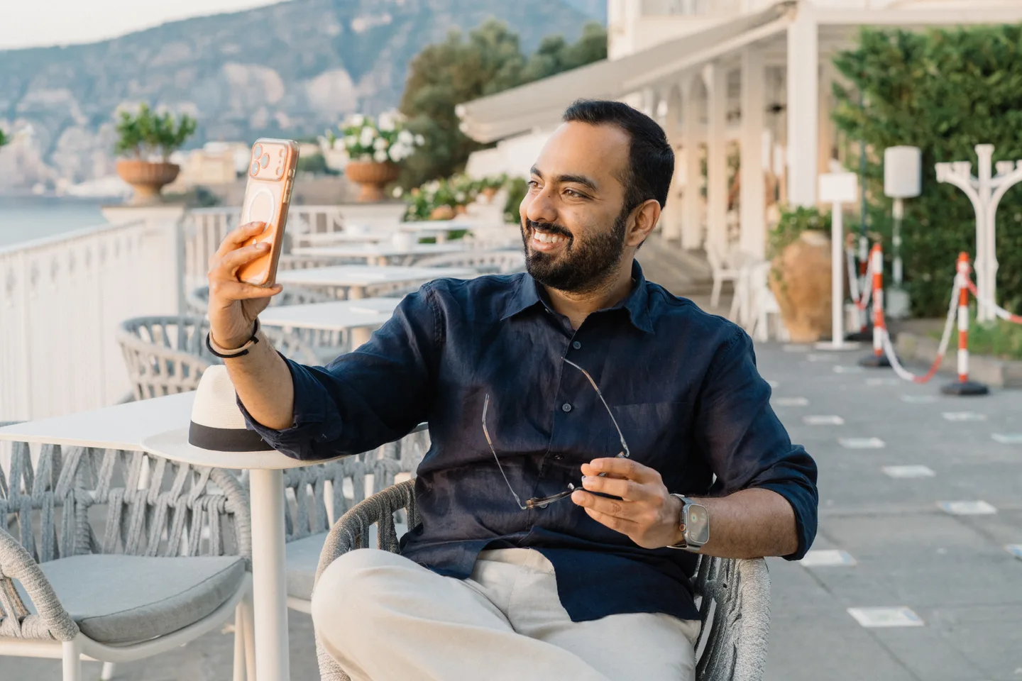 Jatin taking a selfie above the sea