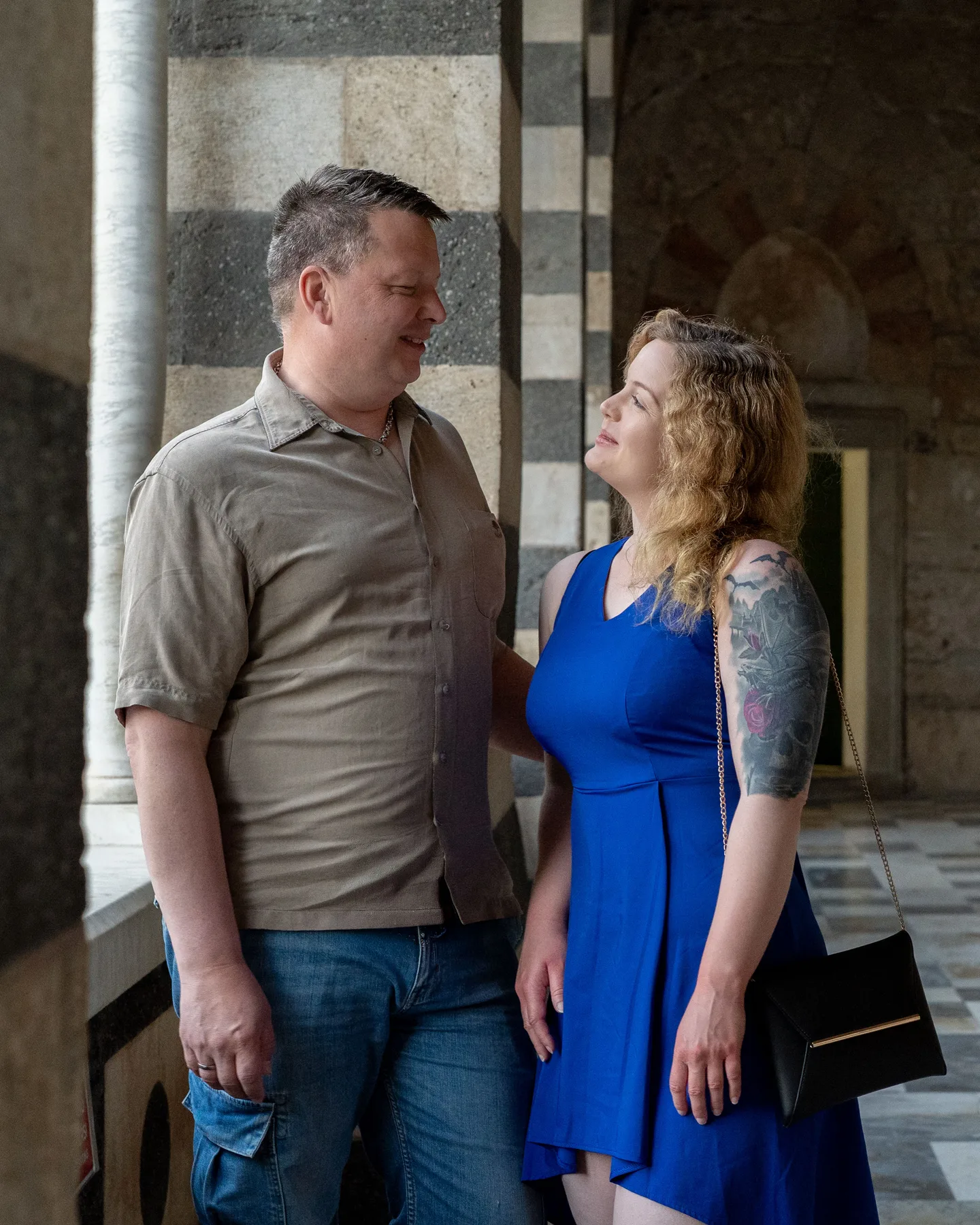 The couple between striped stone columns