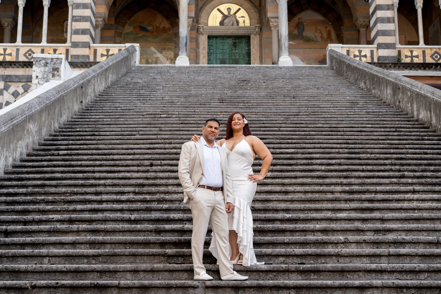 The couple on the steps of Amalfi Cathedral