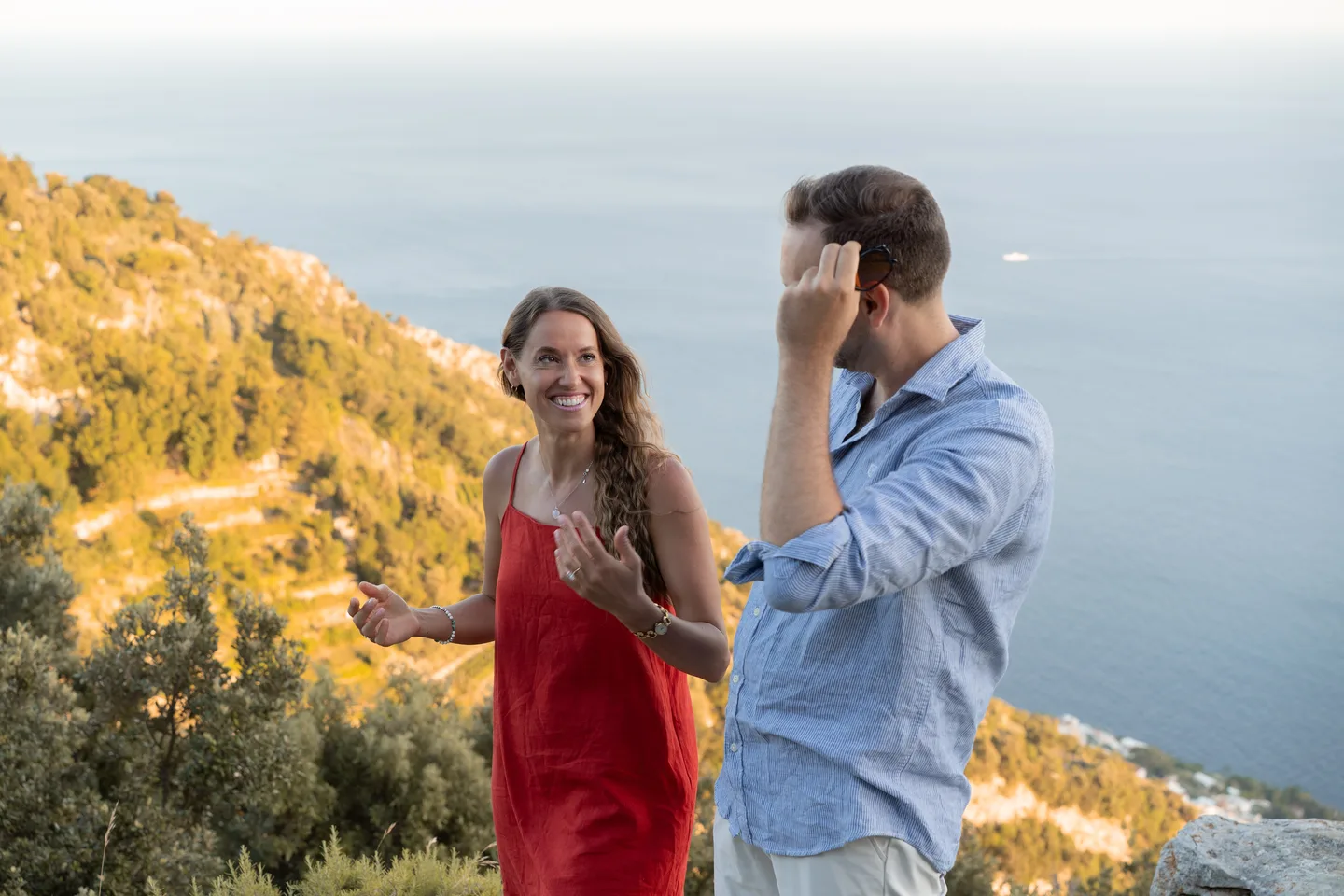 The couple laughing at the viewpoint