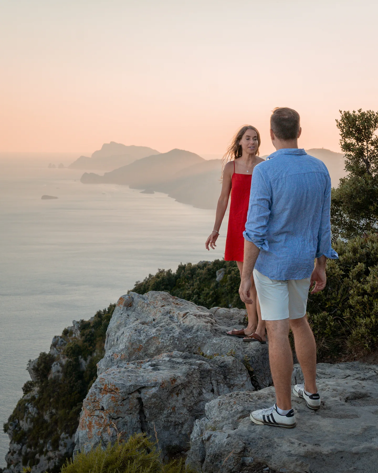 The couple looking out over the coast