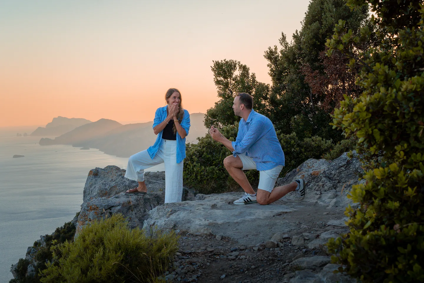A portrait of the proposal scene on the rocks
