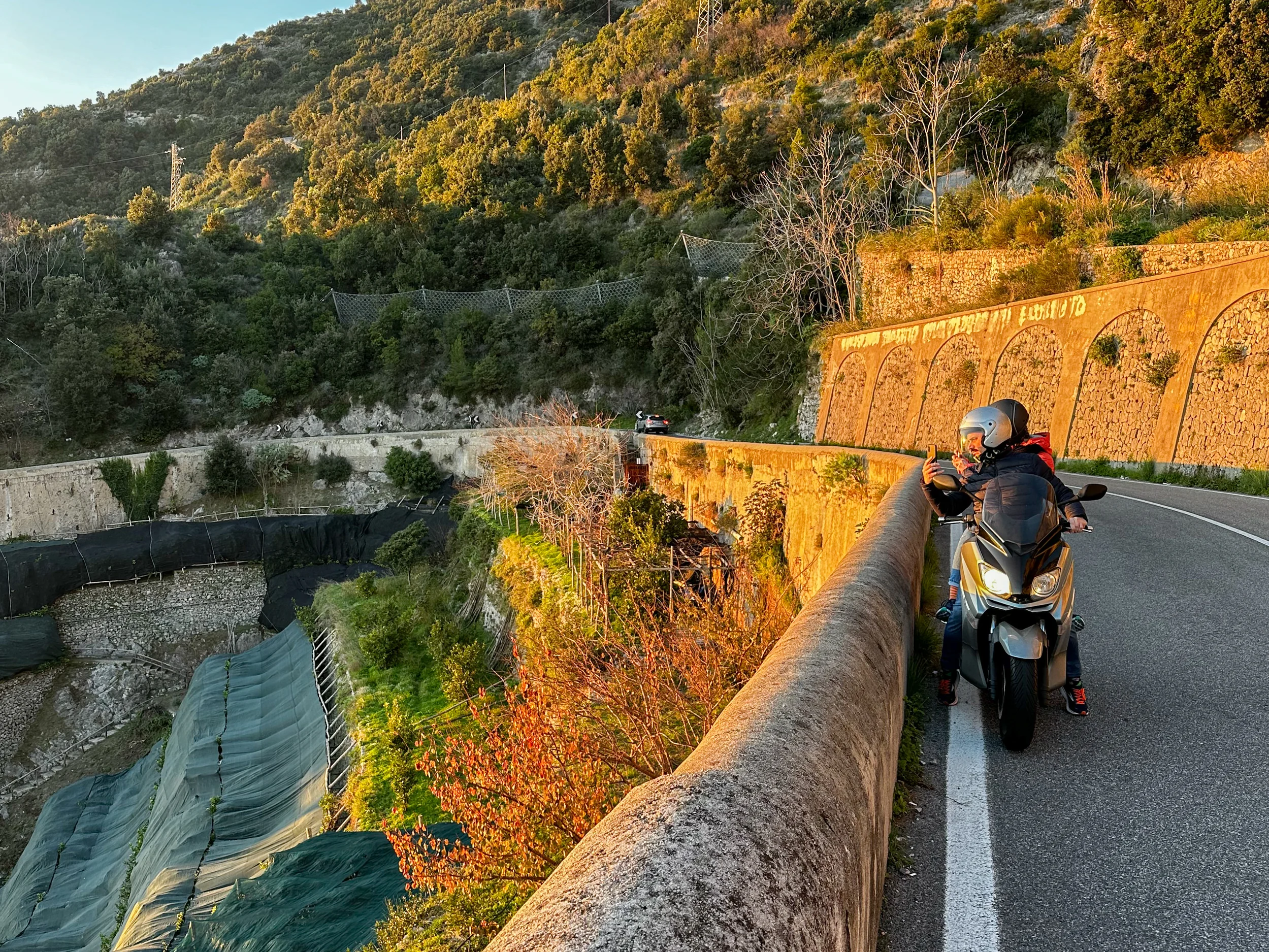 Golden hour portrait on a clifftop overlooking the sea