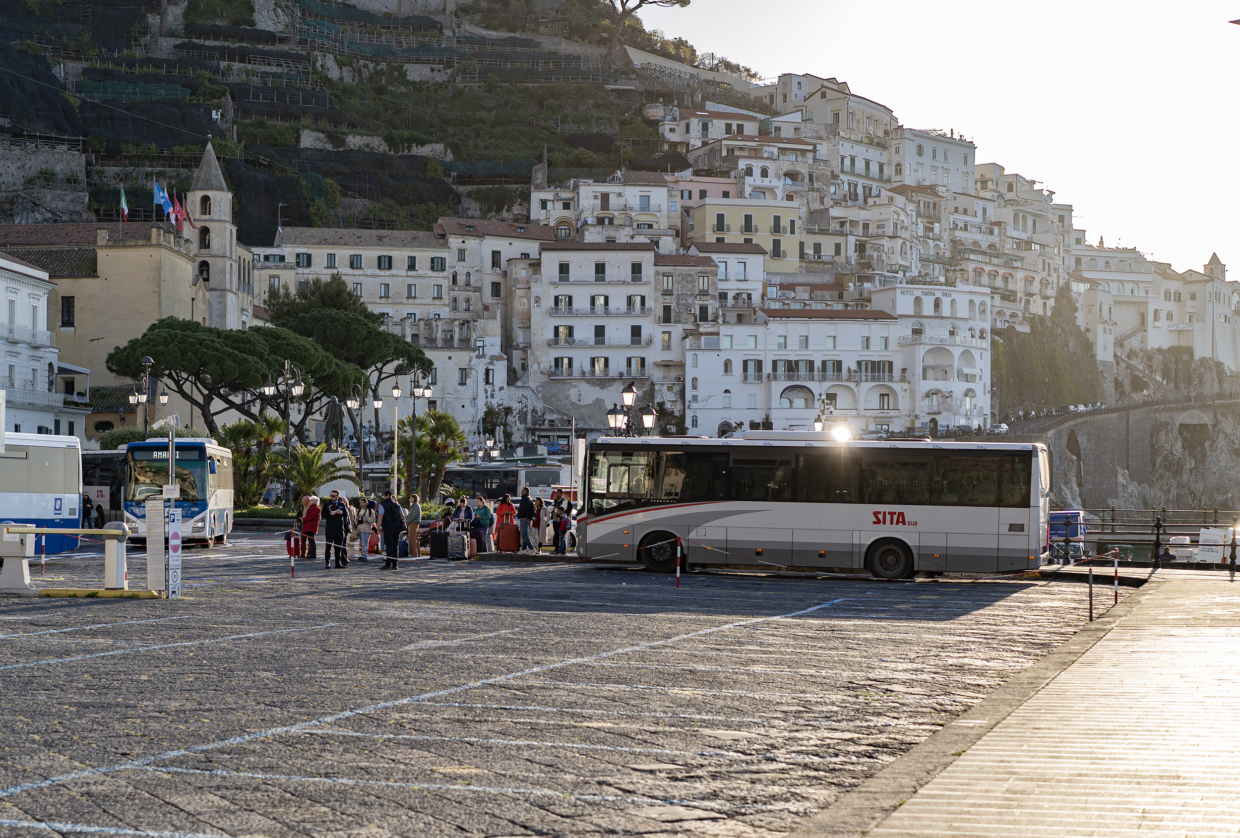 SITA buses waiting near Amalfi harbor